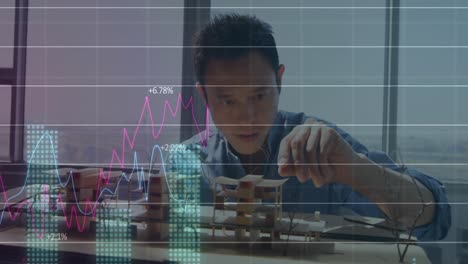 animation of financial data processing over asian businessman