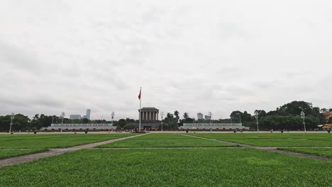 overcast sky over a large, empty public park