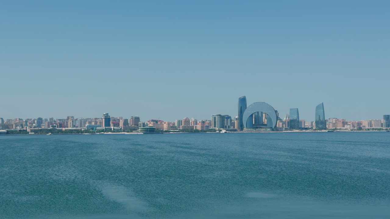 Baku Waterfront Cityscape with Crescent Hotel High-rise on a Sunny Day