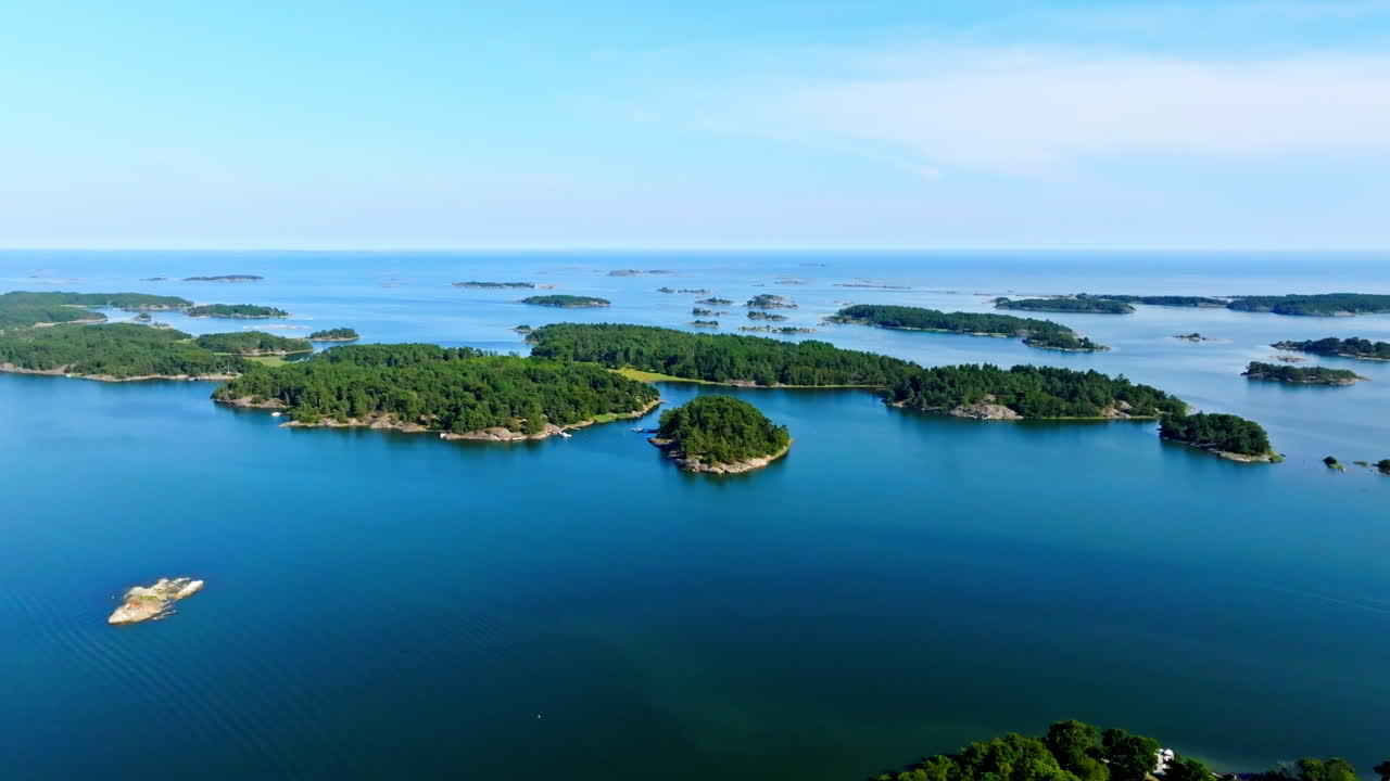 Aerial pull back of islands in the Saaristomeren kansallispuisto, summer in Finland