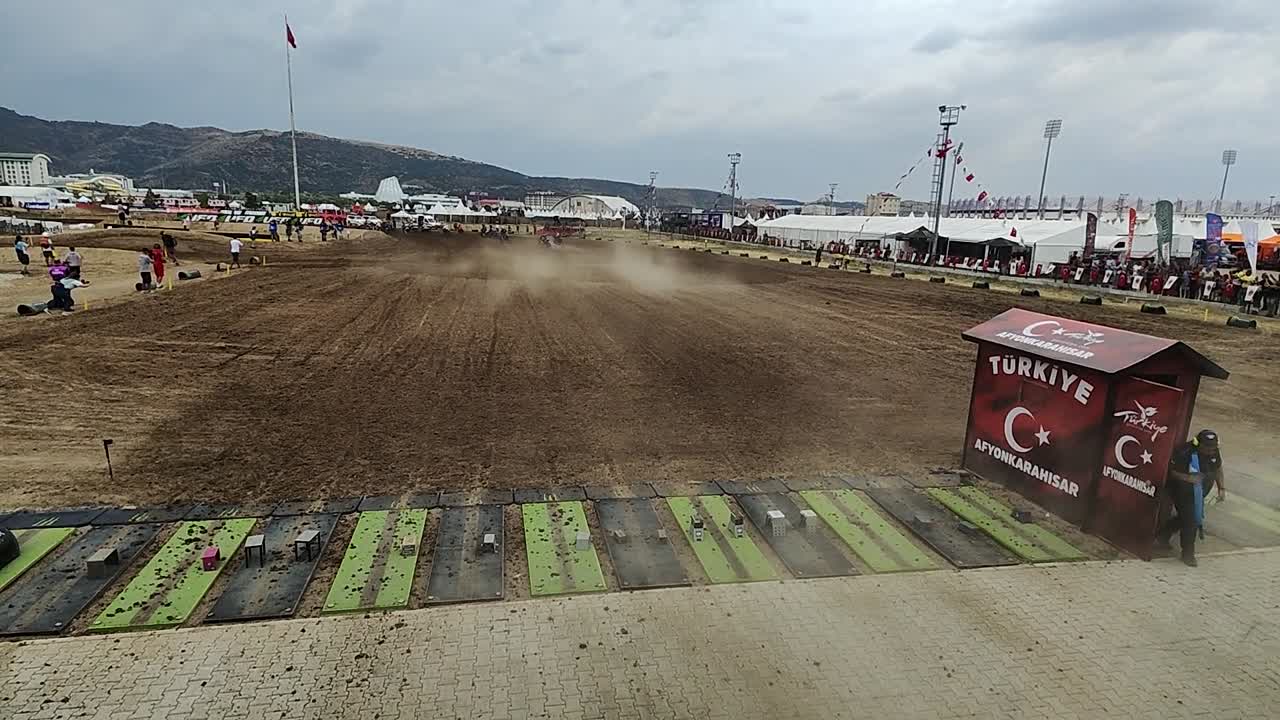 Thrilling motocross racing event Competitors wait in anticipation at starting line ready for start