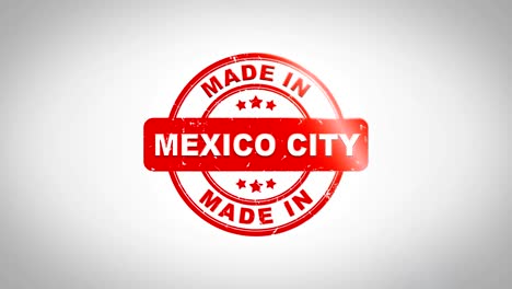 hecho en la ciudad de méxico firmado estampado texto animación de sello de madera. tinta roja en papel blanco limpio fondo de superficie con fondo matte verde incluido.