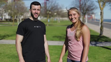 Sporty-people-bumps-fists-after-training-in-summer-park