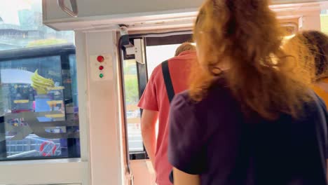 passengers disembark ferry at bangkok pier