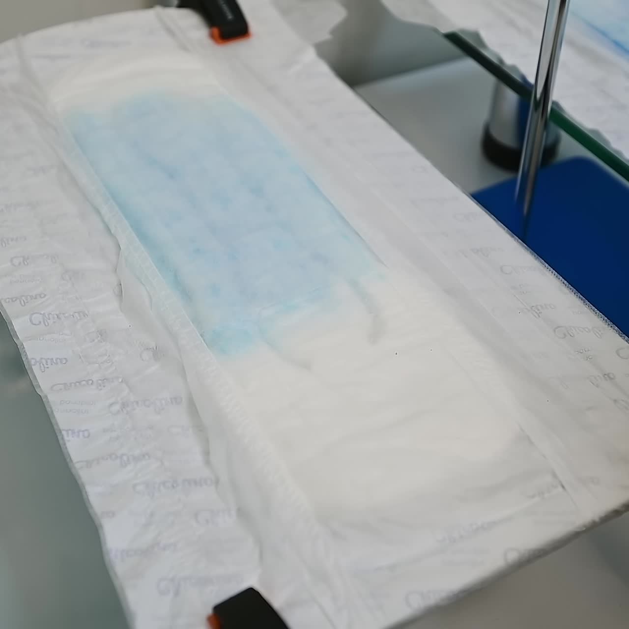 Checking diapers before packing. Worker checks the baby diaper before transport