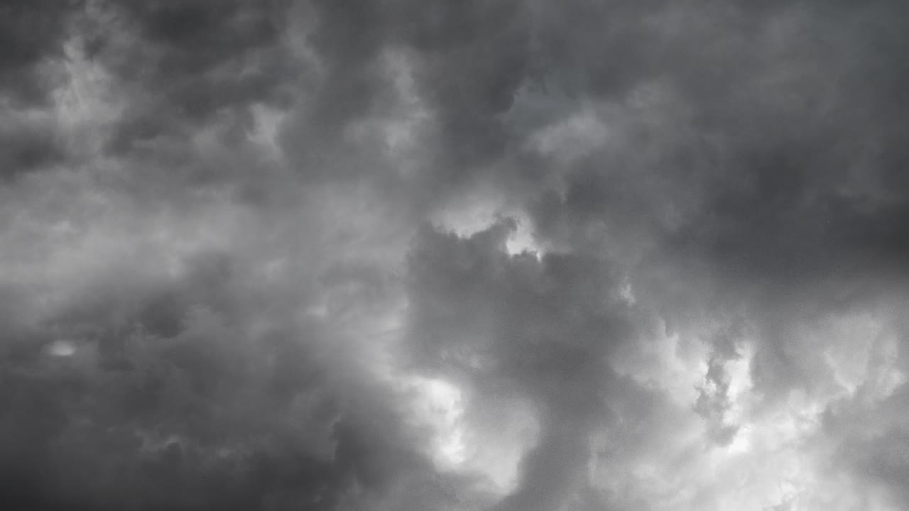 cumulonimbus clouds in the sky accompanied by thunderstorms and storm clouds
