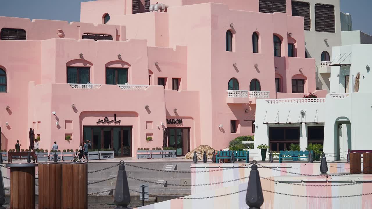 Pink Buildings Waterfront Scene