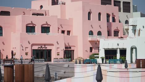 pink buildings waterfront scene
