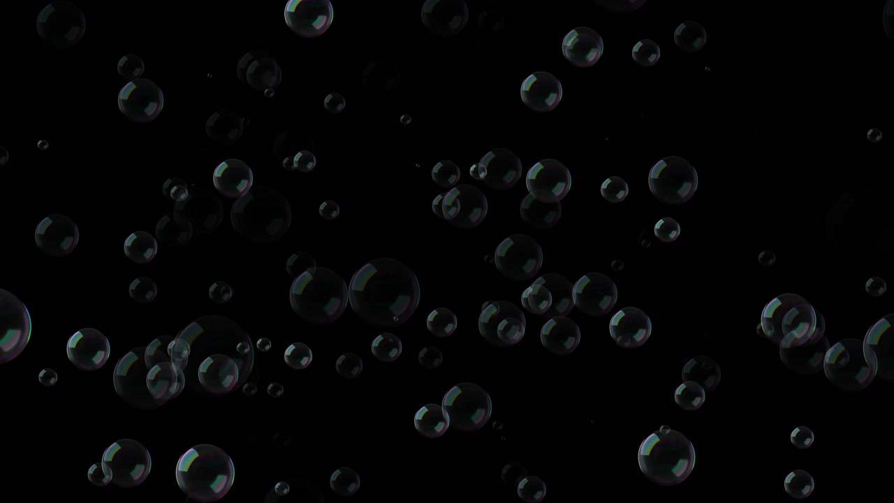 Floating Soap Bubbles Against a Black Background