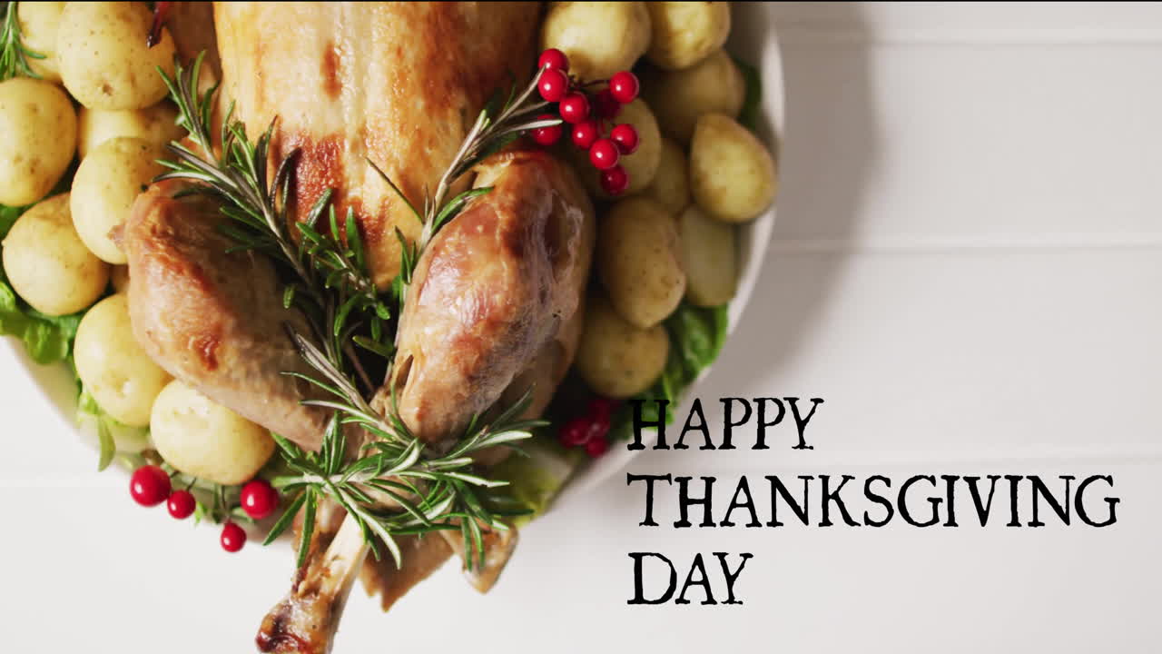 Animation of happy thanksgiving day text over thanksgiving dinner on white boards