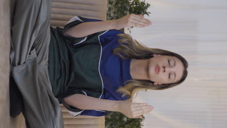 Vertical-video-of-Muslim-young-woman-praying.