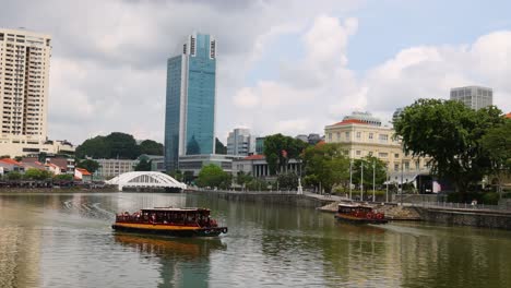 tourist boat cruising along a city river.