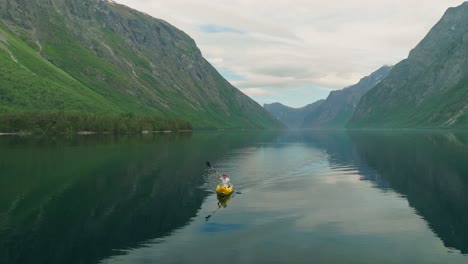 kayaking in a scenic mountain lake