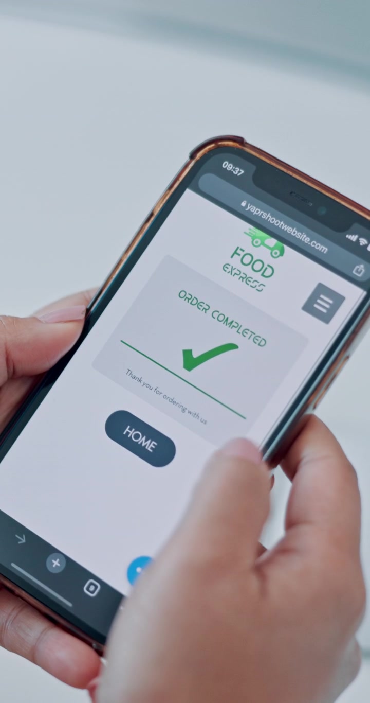 Person Ordering Food Online Using a Smartphone App