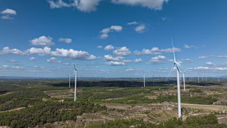 stunning hyperlapse over wind turbines with fast moving