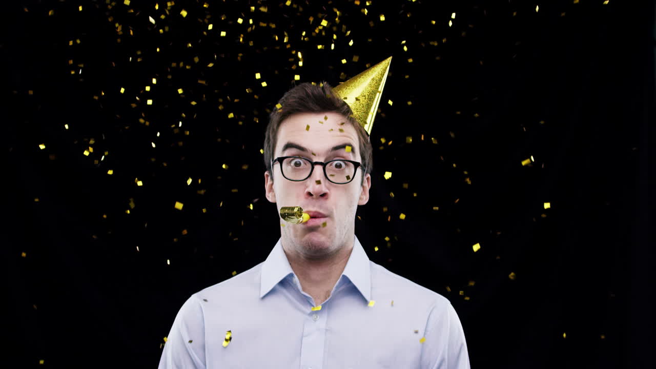 Man Celebrating with Party Hat and Confetti