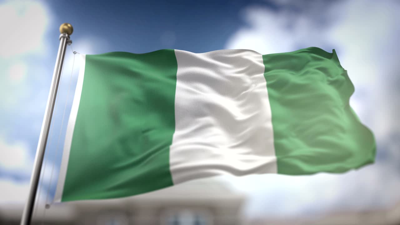 la bandera de nigeria ondeando en cámara lenta 3d con fondo de cielo azul - bucle sin costuras 4k