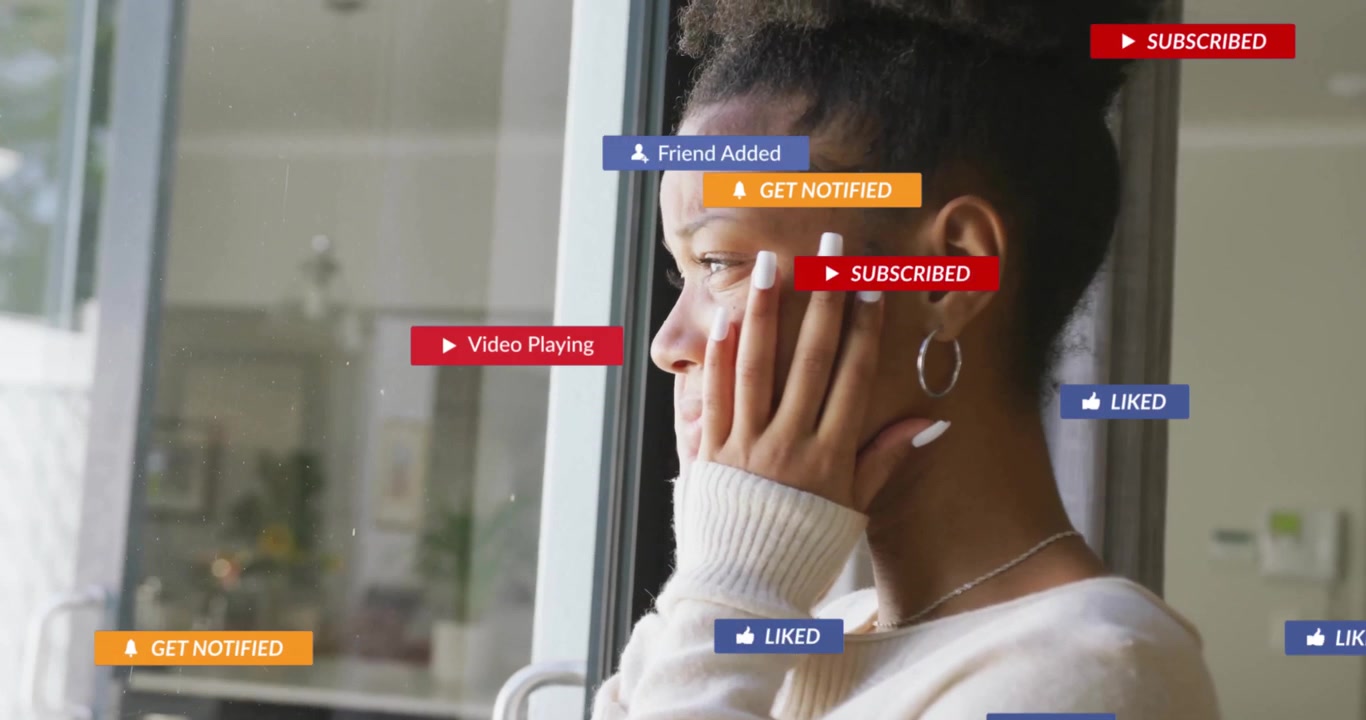 Looking out window, woman viewing animation of social media notifications