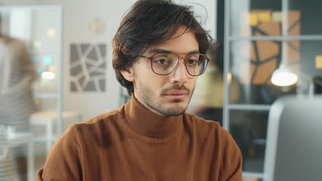 time lapse of middle eastern businessman using computer in office