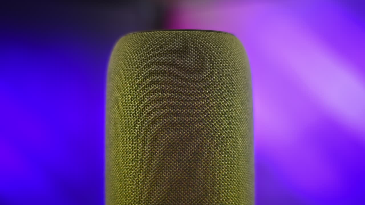 Portable wireless speaker with 4 blinking diodes. Animated background