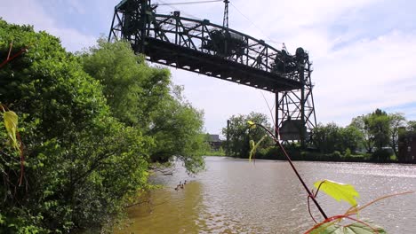 abandoned eagle ave bridge rising over the cuyahoga river in cleveland ohio