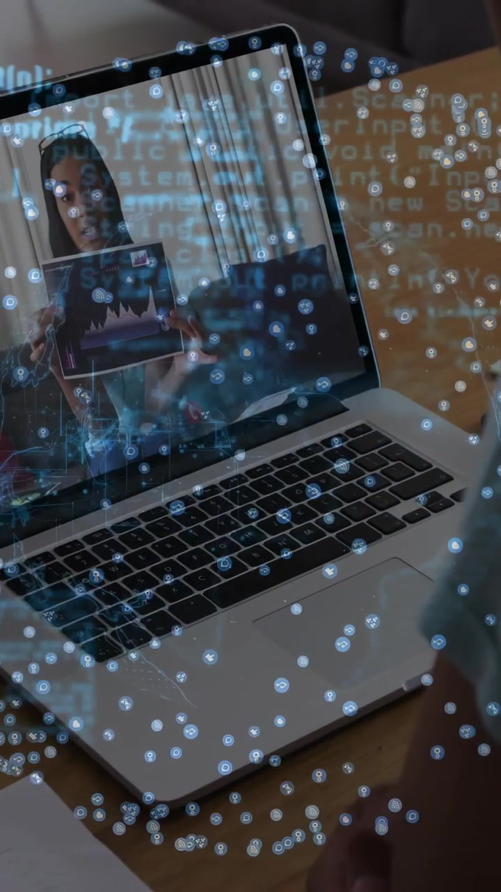 Vertical video: Host showing chart on laptop causing business data overlay and guiding viewer