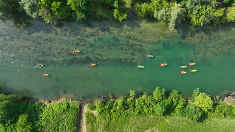 aerial view of kayakers on a river