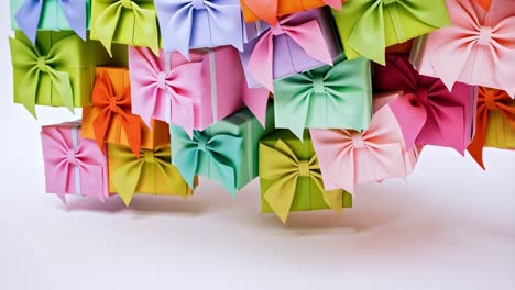colorful stack of gift boxes with bows