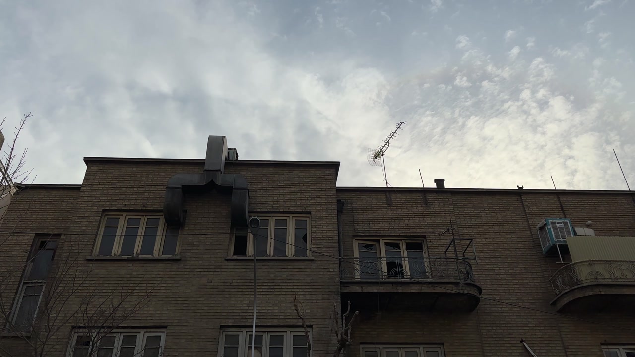 Old brick house Tehran in urban building downtown city traditional street architecture attraction capital and cultural garden heritage historic landmark view Persian sunset landscape balcony outdoors