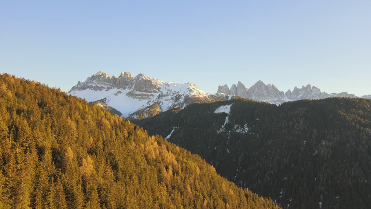 beautiful aerial drone video of the massive dolomite mountains in the Italian alps filmed in 4k in winter - fall