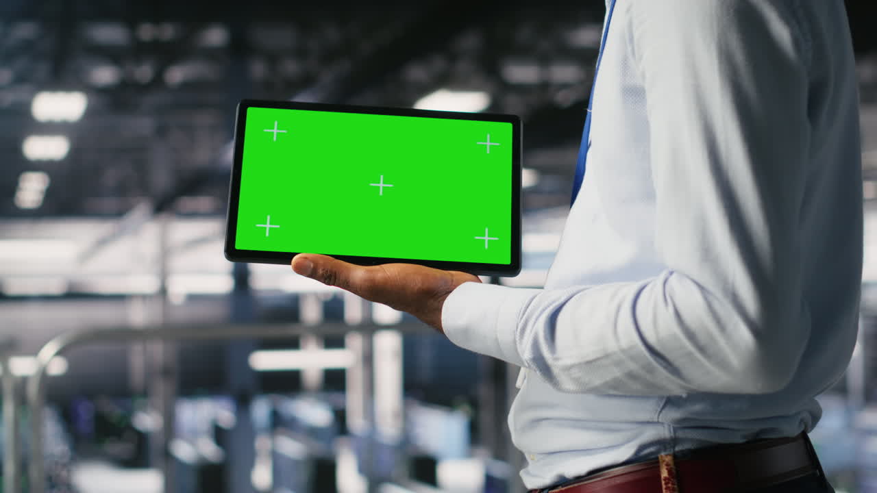 Close up of server farm developer using isolated screen tablet