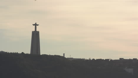 christ the king seen from lisboa at the golden hour