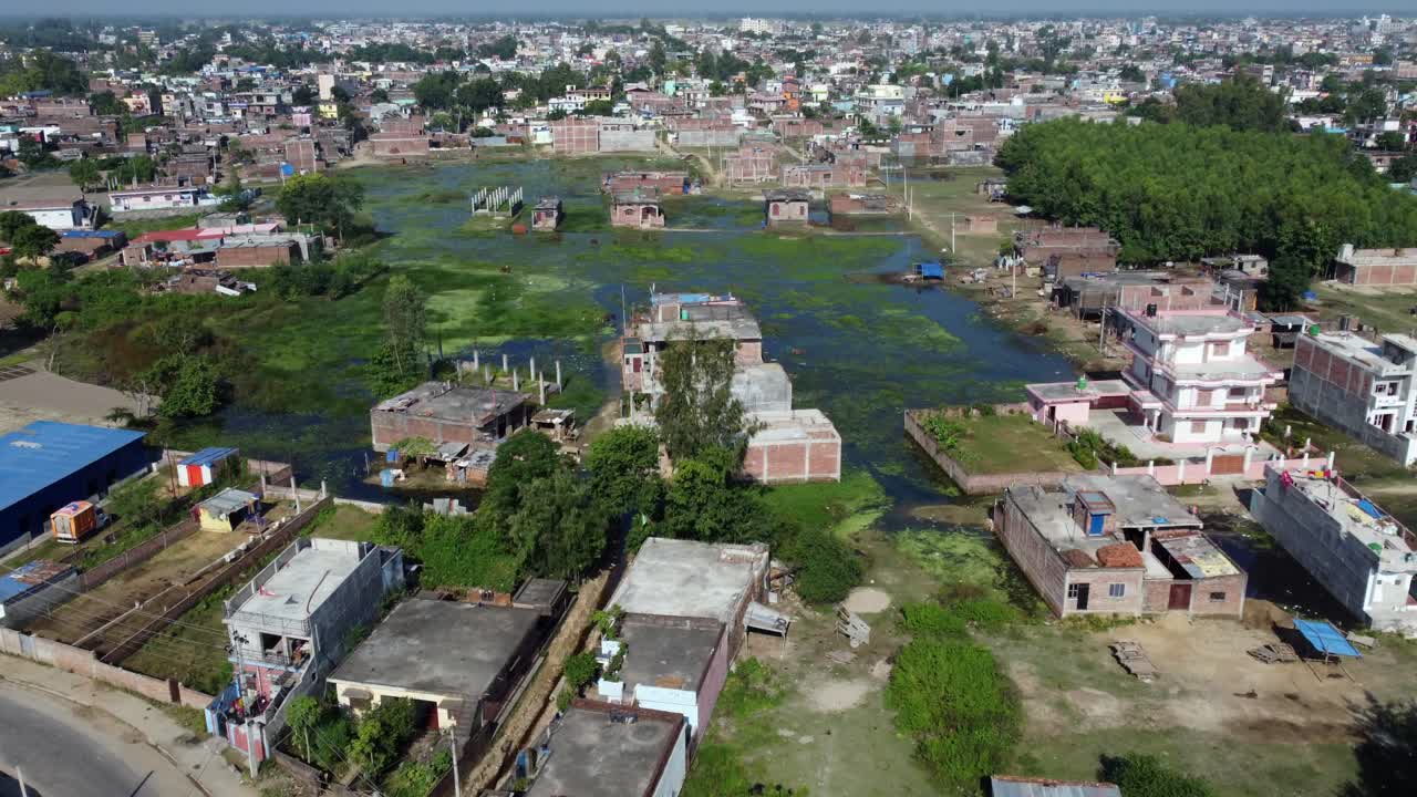 A low level aerial flight over the city of Nepalgunj in the western region of Nepal in the evening light