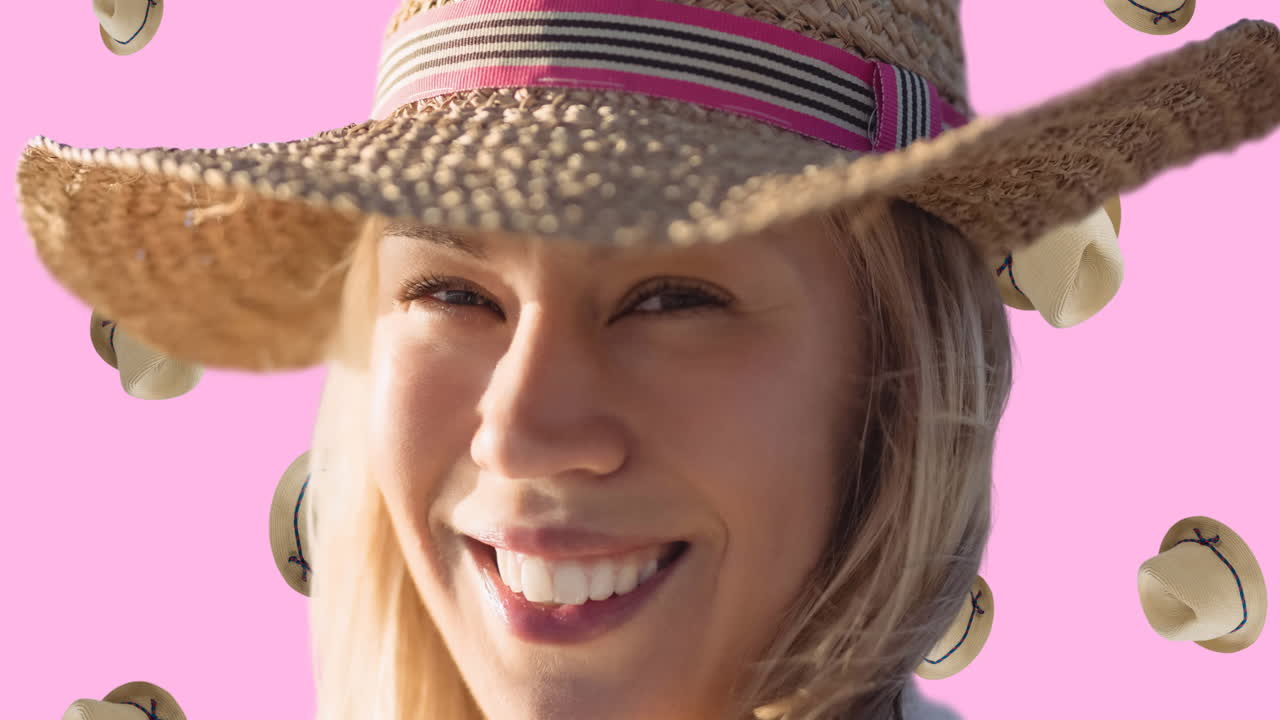 animación de una mujer caucásica sonriente con sombrero sobre sombreros caídos sobre fondo rosa