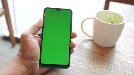 Close-up-of-young-man-hand-using-smart-phone