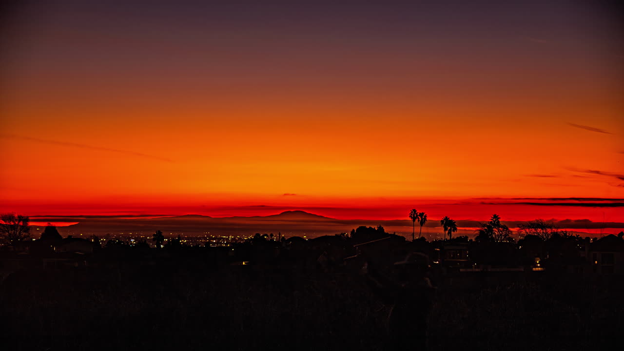 로스앤젤레스의 전망대에서 해가 지는 것을 지켜보는 실루 사람들의 타임스, 캘리포니아, 미국