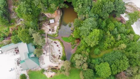 4K-Drone-Video-of-Mining-Train-and-Cave-at-Emerald-Village-near-Little-Switzerland,-NC-on-Summer-Day-1