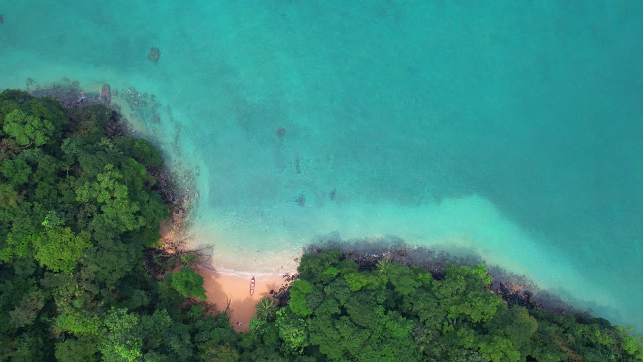Aerial view descending in a spiral shape over the Bay of Agulhas in Ilha do Principe (Prince Island) Sao Tome,Africa