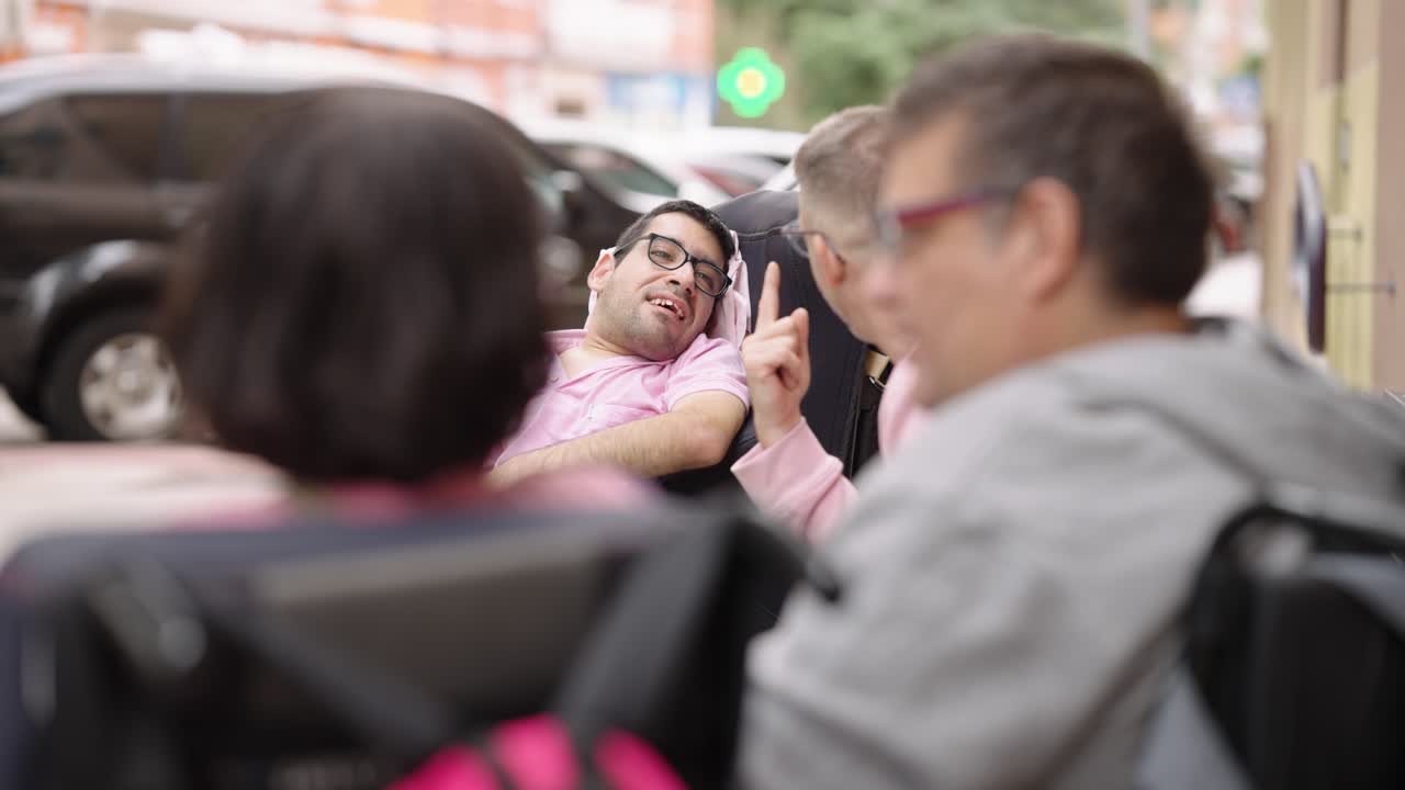 People in Wheelchairs on the Street