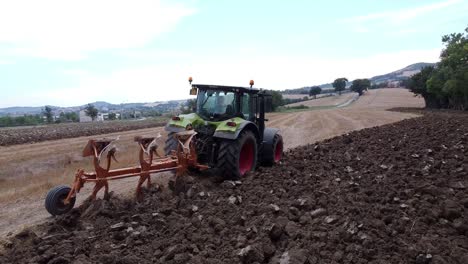 tremendous independent farmer trenching soils at ancona italy