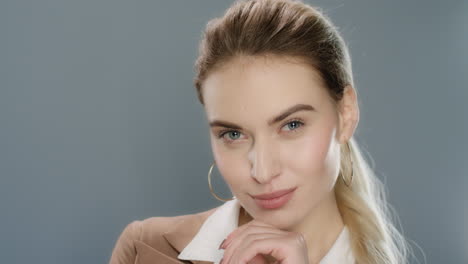 young business woman on gray background