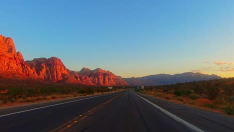 highway jogger and cinemeatic southwest sunrise near red rock canyon nevada