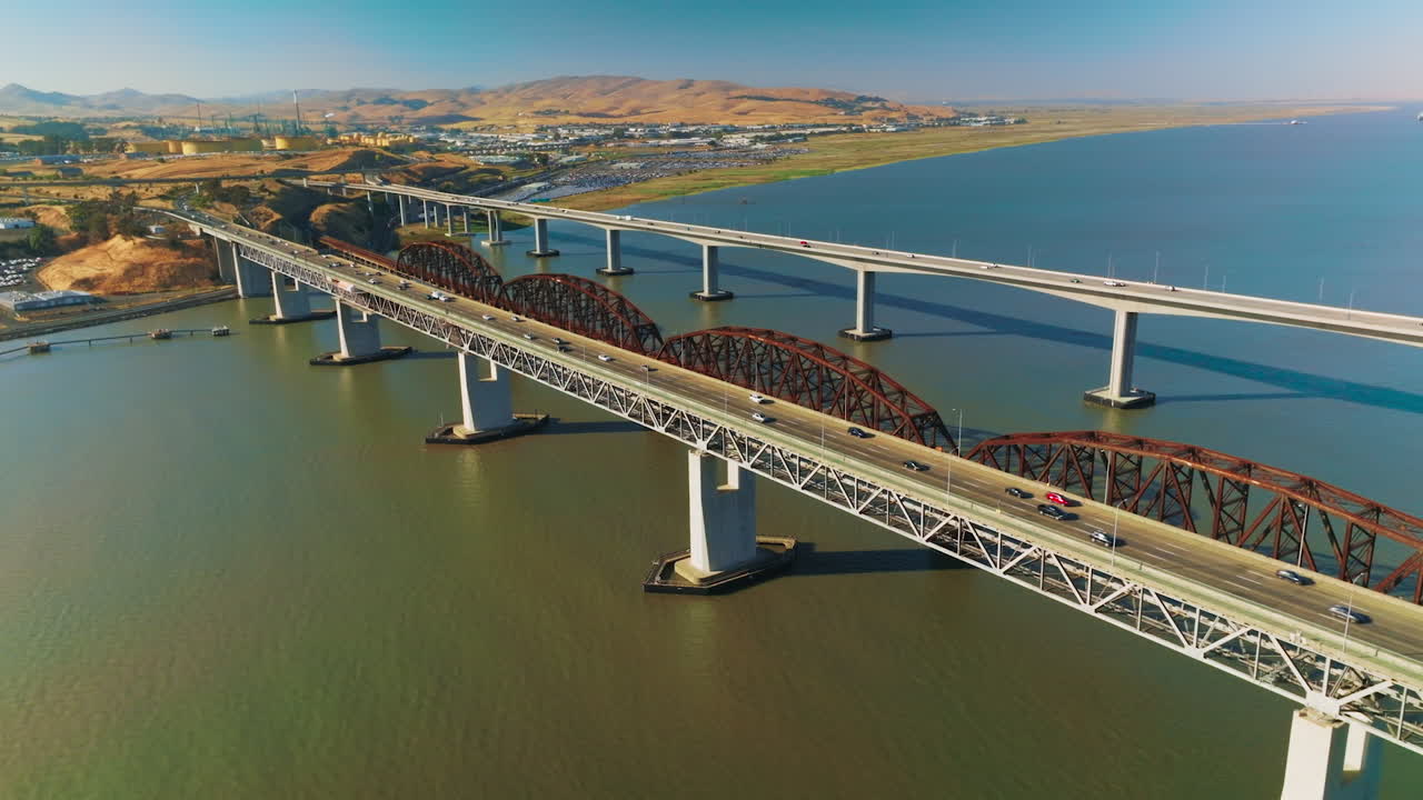 Bridges with highways to both sides. Roads on bridges connecting Martinez to Benicia. Sunny day view from top.