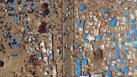 overhead view of locals walking in the road