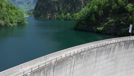 malvaglia dam in switzerland. aerial tilt-down ascending