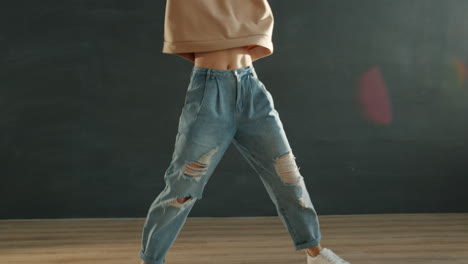 woman dancing in streetwear style