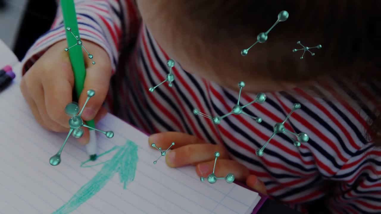 Child steadying paper drawing green triangle in STEM while molecular graphics following strokes