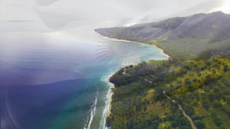 Digital-composition-of-waving-argentina-flag-against-aerial-view-of-the-sea