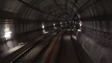 moving through an underground public transit tunnel