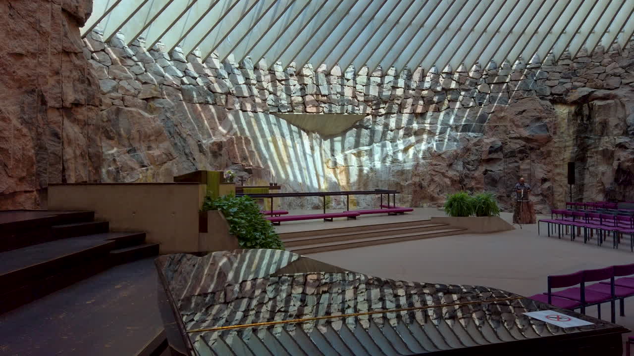 Parallax slider shot of piano, altar, and stunning ceiling reflection at Rock Church